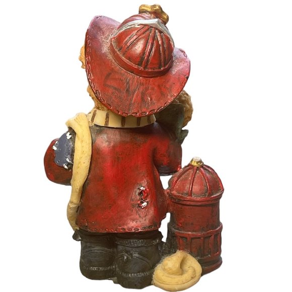 Fireman bear figure holding a baby bear - Picture 3 of 4